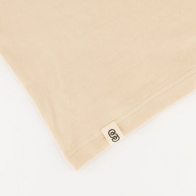 Stillknocks Ivory Boxy Tee: Soft Cotton, Relaxed Drop-Shoulder Fit, Tonal Logo