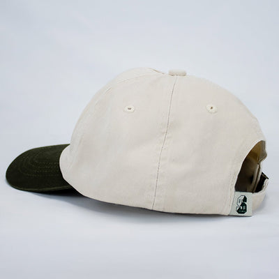 Stillknocks World Champion Two-Tone Dad Cap: Ivory Cotton Twill, Embroidered Globe