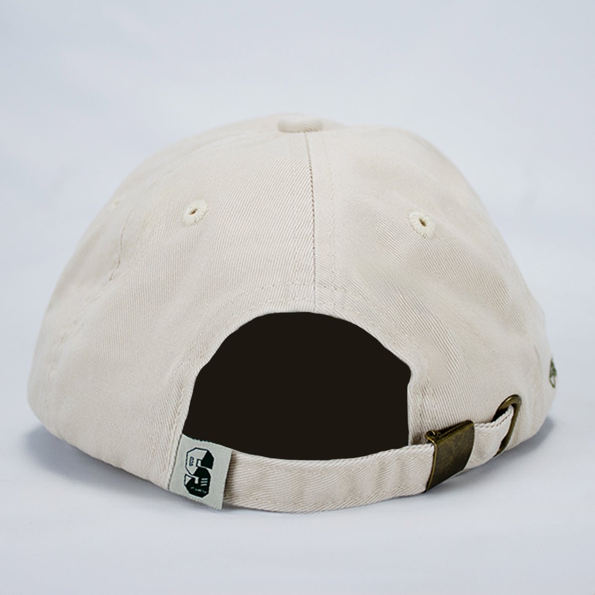 Stillknocks World Champion Two-Tone Dad Cap: Ivory Cotton Twill, Embroidered Globe